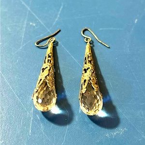 Clear pierced earrings with silver accents